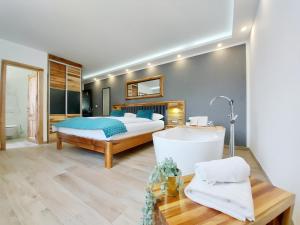 Posteľ alebo postele v izbe v ubytovaní Etno Boutique