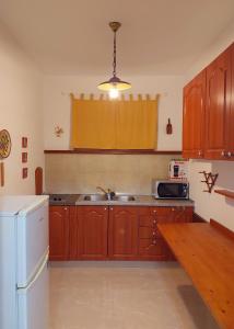 Kuchyň nebo kuchyňský kout v ubytování House Leticija rustica
