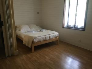 Ein Bett oder Betten in einem Zimmer der Unterkunft Hotel MAZIN