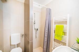 Kúpeľňa v ubytovaní Phoenix Apartman Siófok