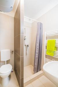 Kúpeľňa v ubytovaní Phoenix Apartman Siófok
