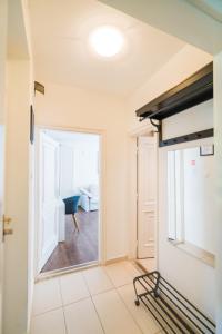 Posteľ alebo postele v izbe v ubytovaní Phoenix Apartman Siófok