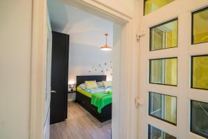 Posteľ alebo postele v izbe v ubytovaní Phoenix Apartman Siófok + 37 fotografií