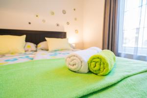 Posteľ alebo postele v izbe v ubytovaní Phoenix Apartman Siófok