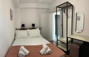 Ένα ή περισσότερα κρεβάτια σε δωμάτιο στο Kekezis Apartments