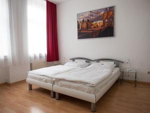 Postel nebo postele na pokoji v ubytování Hotel Westend + 27 fotografií