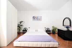 Postel nebo postele na pokoji v ubytování iFlat Angel's floor