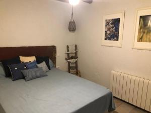 Posteľ alebo postele v izbe v ubytovaní Cal Tató Apartament