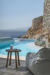 The swimming pool at or near Arocaria Mykonos