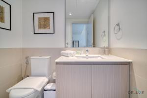 Koupelna v ubytování Graceful 1BR at Park Heights Dubai Hills MBR City by Deluxe Holiday Homes