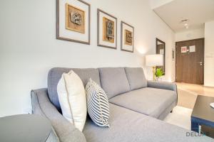 Posezení v ubytování Graceful 1BR at Park Heights Dubai Hills MBR City by Deluxe Holiday Homes