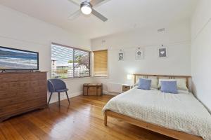 Giường trong phòng chung tại Milville