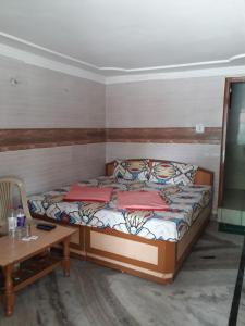 Postel nebo postele na pokoji v ubytování Hotel Rajpal Guest House
