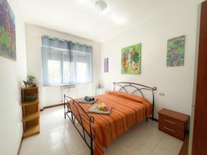 A bed or beds in a room at Ondamare