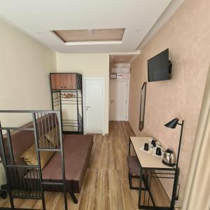 TV a/nebo společenská místnost v ubytování Up Hostel