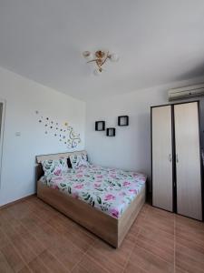 Postel nebo postele na pokoji v ubytování Sejur la mare