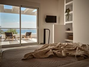Postel nebo postele na pokoji v ubytování Margie Sea View Apartment
