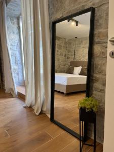 Posteľ alebo postele v izbe v ubytovaní La Taberna
