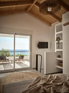 Postel nebo postele na pokoji v ubytování Margie Sea View Apartment