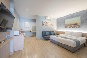 Postel nebo postele na pokoji v ubytování Tarnsiri Boutique Resort