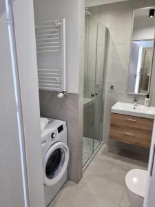 Un baño de JBHotels Apartament Comfort Hanza Tower