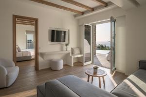 TV a/nebo společenská místnost v ubytování Arocaria Mykonos