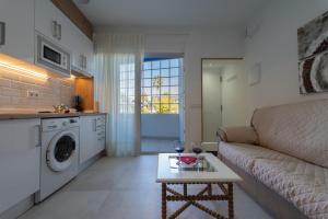 Kuchyň nebo kuchyňský kout v ubytování Apartamentos turísticos De La Abuela Carmen
