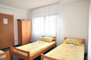Postel nebo postele na pokoji v ubytování Hostel Room