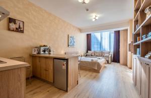 Postel nebo postele na pokoji v ubytování Studio Apartment NFT New Gudauri 108 + 37 fotografií
