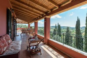 a balcony with a view of the hills at Lily's House in Áno Korakiána