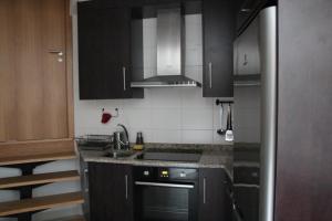 A cozinha ou kitchenette de Casas do Aidro