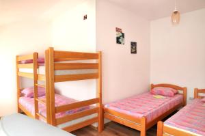 Postel nebo postele na pokoji v ubytování Hostel Room