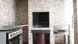 A cozinha ou kitchenette de Casas do Aidro