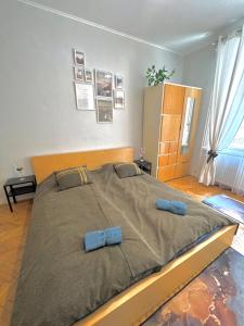 Posteľ alebo postele v izbe v ubytovaní Bonifac Apartman