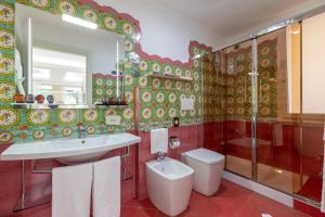 Koupelna v ubytování Boutique Hotel Paradiso Bovelacci