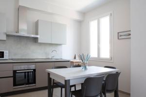 Η κουζίνα ή μικρή κουζίνα στο Le case di vada/Appartamento il Fortino 3 +7 φωτογραφίες