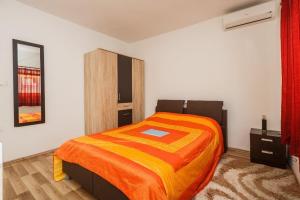 Posteľ alebo postele v izbe v ubytovaní NaLa apartments