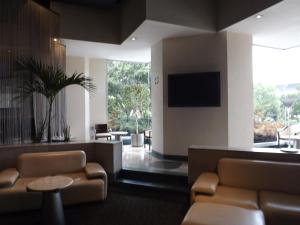 Un lugar para sentarse en Royal Pedregal
