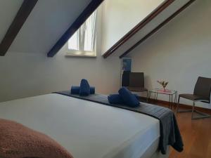 Postel nebo postele na pokoji v ubytování Villa Rita