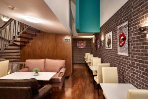 Posezení v ubytování Galeria Suite Hotel