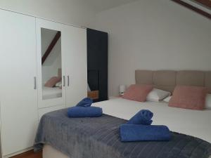 Postel nebo postele na pokoji v ubytování Villa Rita