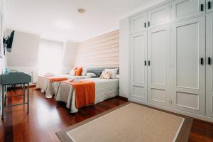 Cama o camas de una habitación en PENSIÓN CALDEA