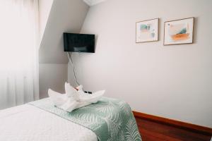 Cama o camas de una habitación en PENSIÓN CALDEA
