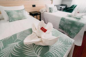 Cama o camas de una habitación en PENSIÓN CALDEA
