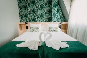 Cama o camas de una habitación en PENSIÓN CALDEA