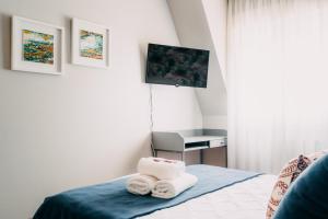 Cama o camas de una habitación en PENSIÓN CALDEA