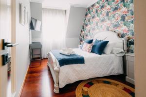 Cama o camas de una habitación en PENSIÓN CALDEA