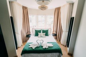 Cama o camas de una habitación en PENSIÓN CALDEA
