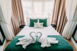 Cama o camas de una habitación en PENSIÓN CALDEA