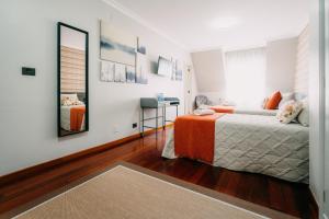 Cama o camas de una habitación en PENSIÓN CALDEA